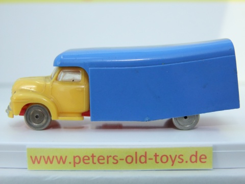 1257-01 Ausführung Norwegen, Aufbau ohne Bedruckung, Blinker auf den Kotflügeln, Fahrerhaus:gelb, Aufbau:blau, Chassis: rot